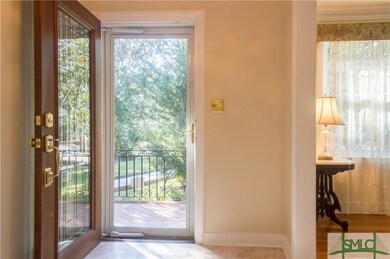Sweet foyer leads to formal living room.