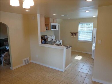 Kitchen. New light fixtures including recessed lighting has been installed in the dining room and kitchen.