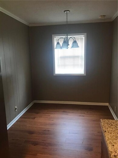 Breakfast area off kitchen with separate laundry r