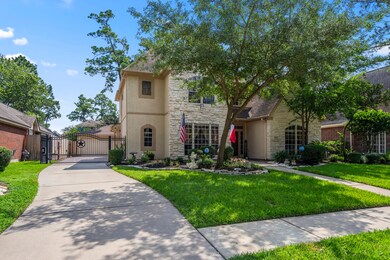 The driveway is both practical and elegant, featuring an automatic gate that provides added privacy and security. The gate is tastefully designed, harmonizing with the overall architectural style of the home. It opens smoothly, inviting guests while maintaining a sense of exclusivity. This combination of beauty and functionality makes the home a perfect blend of comfort and sophistication, offering a peaceful retreat from the outside world.