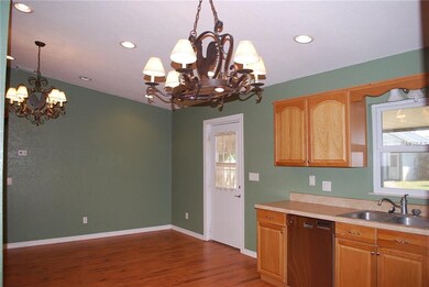 The kitchen has large eat in area