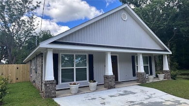 View of front of house featuring covered porch