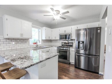 You are going to love the updated eat-in kitchen f