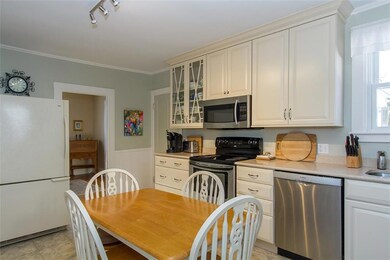 Another view of the kitchen, looking...