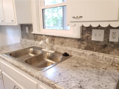 NEW COUNTER TOPS AND BACK SPLASH