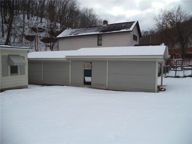 backyard view of shed area