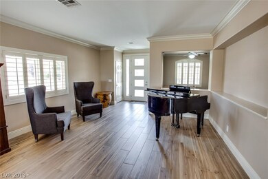 Enter into formal living room with office/den to t