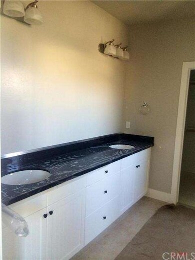Master bathroom vanity with dual sinks, quartz cou