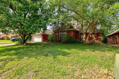 View of yard featuring a garage