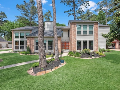 Pretty trees and landscaping are welcoming