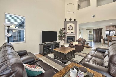 Open concept living, dining, kitchen with vaulted 