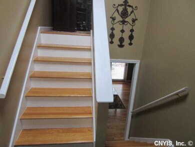 Foyer split style front entrance with skylight
