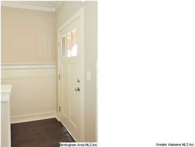 A Unique Foyer Enhanced w/Bead Board and Wide Mold
