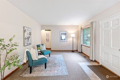 Huge living room, opening in the background leads to the master bedroom to the right, and bedroom #2/office to the left.