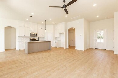 Kitchen featuring light hardwood / wood-style floo