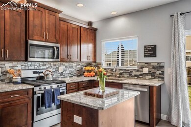 Kitchen with stainless steel appliances, tasteful 