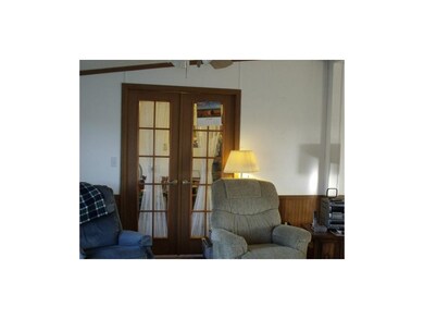 Door to office that could be used as 3rd bedroom.