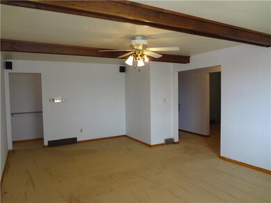 Living Room. Another view with openings to the hal