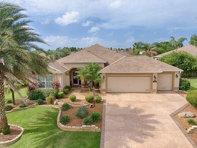 BEAUTIFUL LANDSCAPING WITH STAMPED DRIVEWAY, STACK