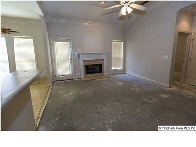 Living Room is open to kitchen with vaulted ceilin