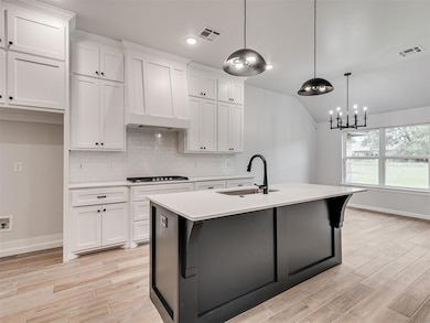 Kitchen featuring light hardwood / wood-style floo