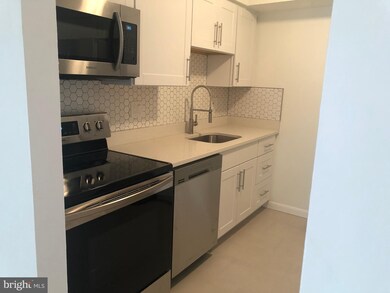 8865 Roll Right Ct unit M, Columbia, MD 21045 - photo 2