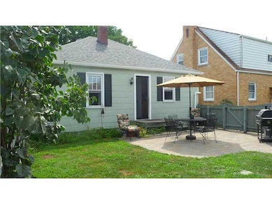 Exterior Back. New brick patio, fenced in yard, ho