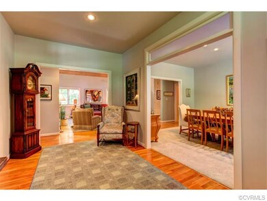 The spacious foyer is open to the dining room, the