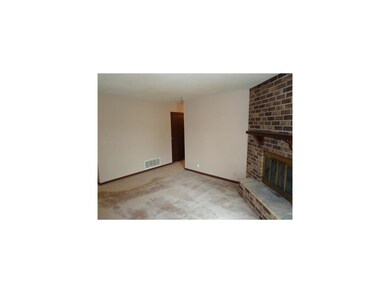 Family Room. Large family room with brick, woodbur