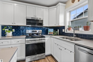 2087 Staghorn Ave, Grawn, MI 49637 - photo 4