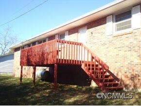 Back of house w/small creek