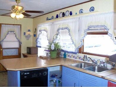 Kitchen. Kitchen windows offer lots of natural lig