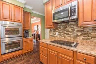 SS appliances, mosaic glass back splash, Old Engli