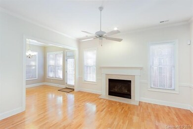 Family Room With Gas Fireplace Overlooking Private
