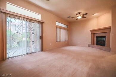 Larger great room with ceiling fans and fireplace