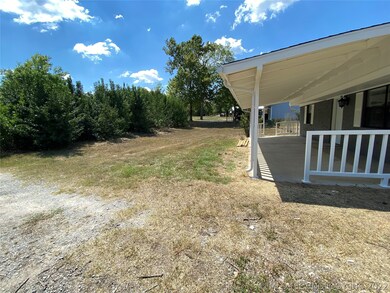 Front yard with privacy screen of trees