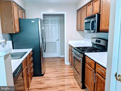 10998 Koman Cir unit 102, Manassas, VA 20109 - photo 5