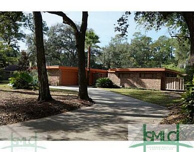 Exterior Front. Oak, palm, magnolia, palmetto, cam