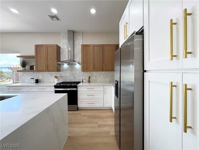 Kitchen featuring stainless steel fridge, tasteful