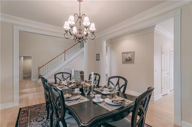 Separate Formal Dining Room that is open to the Living Room, Breakfast Room & Kitchen areas.