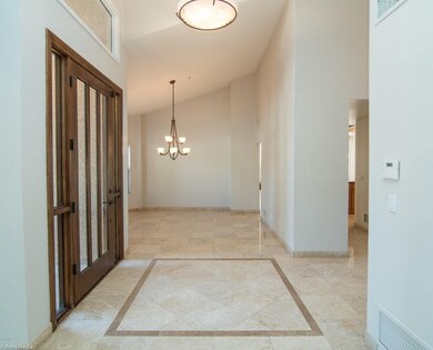2 12246 N 86th Pl Dining Room and Entry