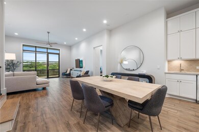 Dining room featuring light wood-style floors, re