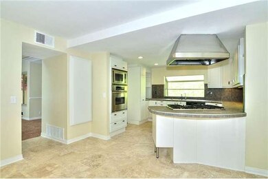 Taken from Family/Dining Room Looking into Kitchen