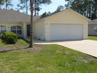 11 Regent Ln unit B, Palm Coast, FL 32164 - photo 2