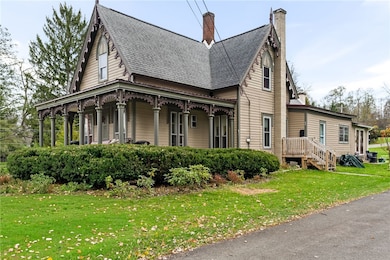 211 Main Street - 2 stories. has four 1 bedroom apartments.