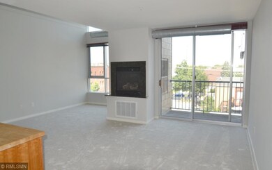 Gas fireplace with marble surround and fan