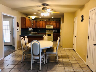 Kitchen/Dining Area flowing in from the living roo