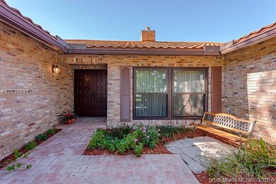 PRIVATE FRONT PORCH AND DOUBLE DOOR ENTRY