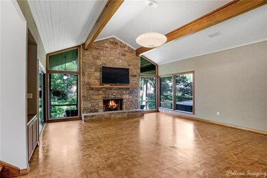 Fabulous family room with soaring windows looking 