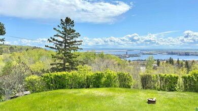 View of yard with a water view